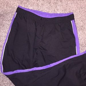 purple/black track pants
